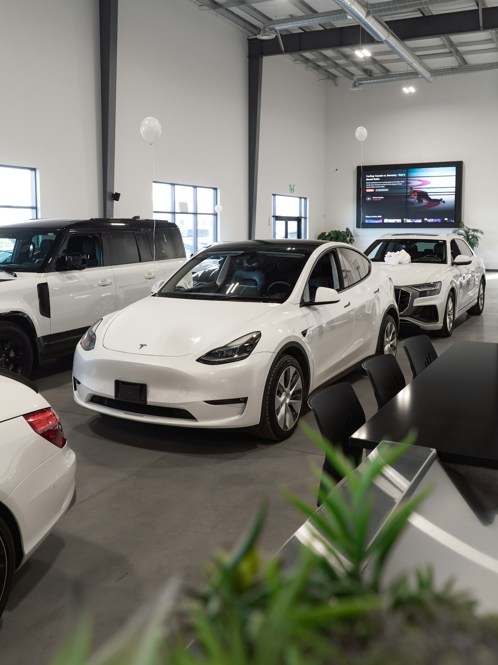 Bright car showroom with polished floors
